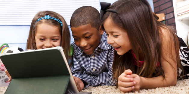 Education: Multi-ethnic Elementary 7-8 year olds digital tablet
